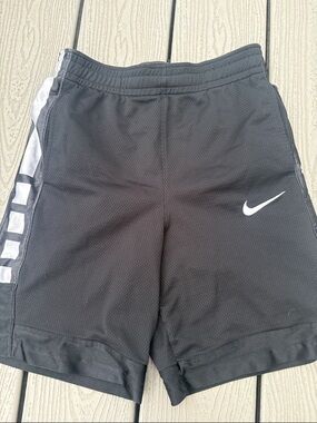 Nike Black Athletic Basketball Shorts with White Swoosh and Side Stripe